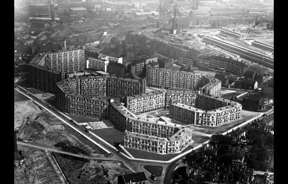 Aerial photograph of Park Hill soon after construction, as seen from the south, with industrial parts of the city beyond. Courtesy of Bill Toomey, RIBA Library Photographs Collection